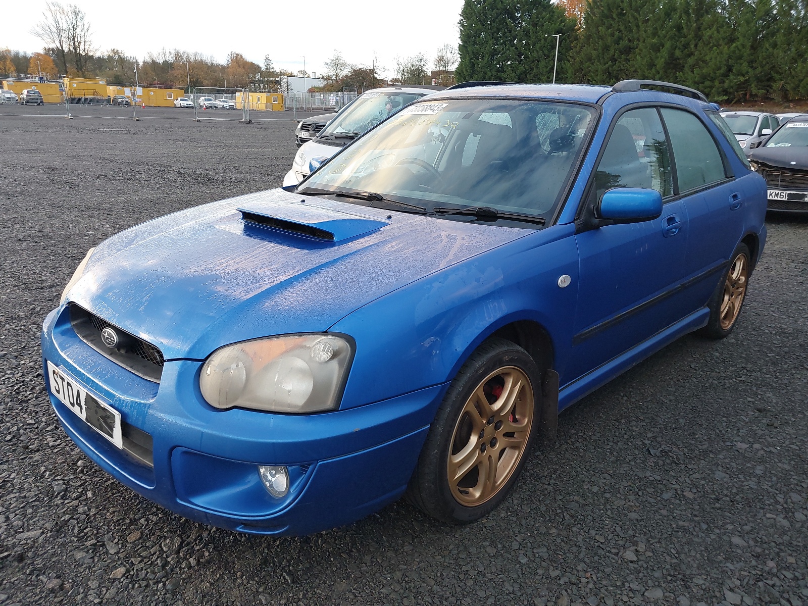 A Blue Subaru Impreza from the front-right.